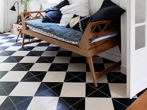 white-black-checkerboard-cement-tile-hallway-floor
