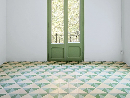 green-geometric-cement-tiles-bedroom-floor
